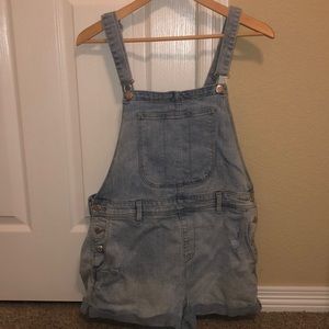 Distressed, oversized overalls